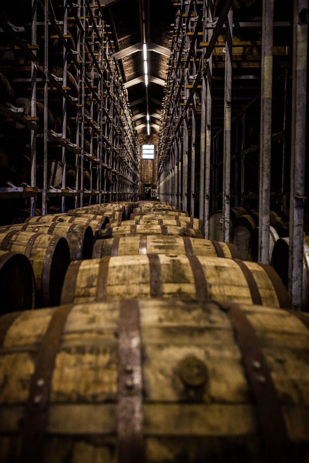 Whisky Casks Stored At Distillery Warehouse in Scotland